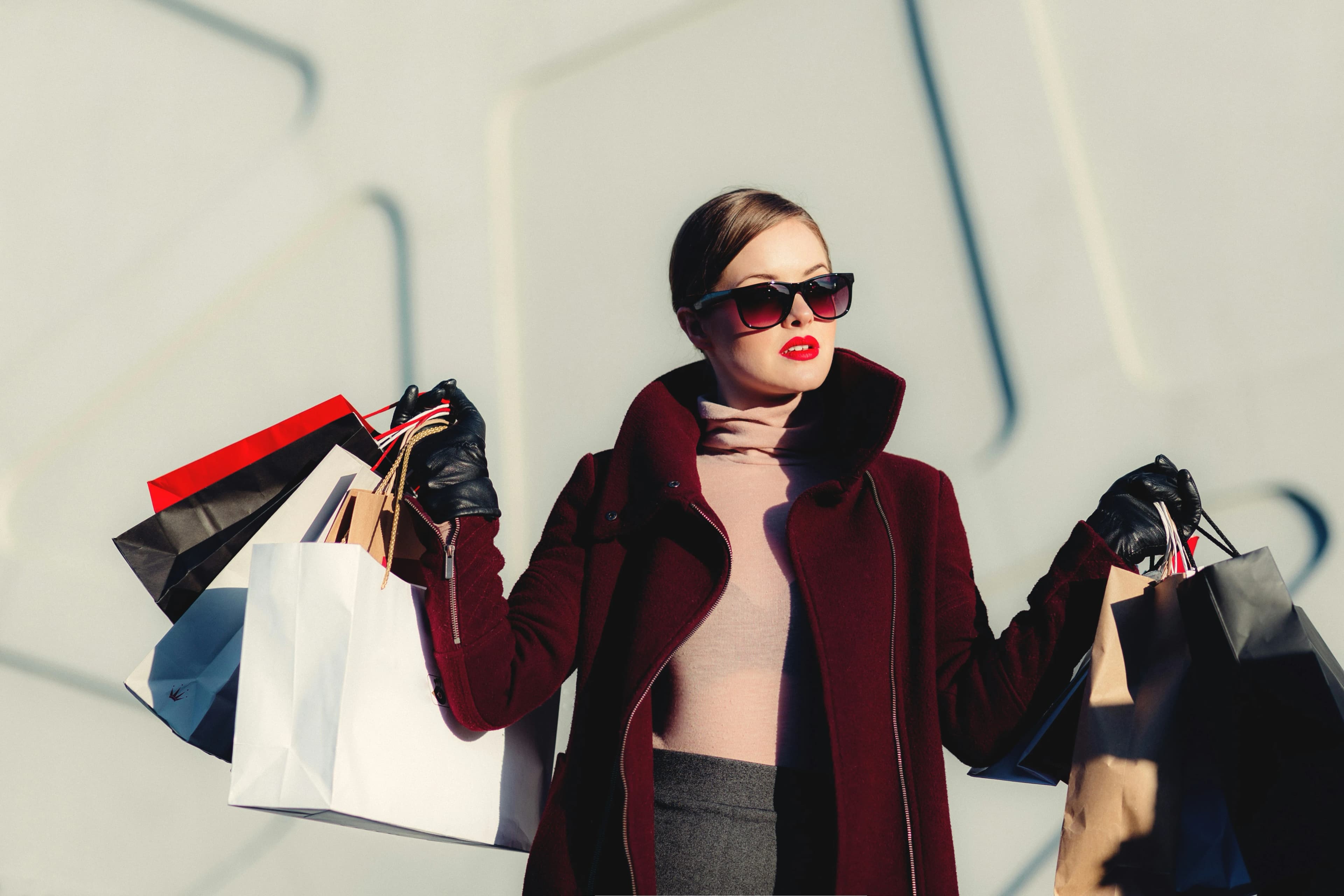 Woman with a lot of shopping bags